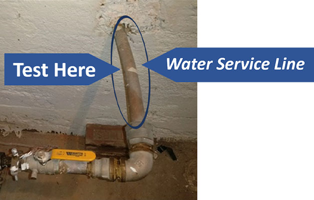 Image of typical service line location with an arrow pointing toward the best testing location