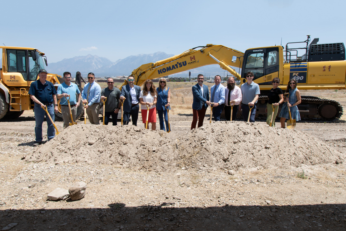 Herriman City Council members and staff stand with representatives of Elevated Property Company at a groundbreaking ceremony of The Commons at Herriman Towne Center | June 27, 2025