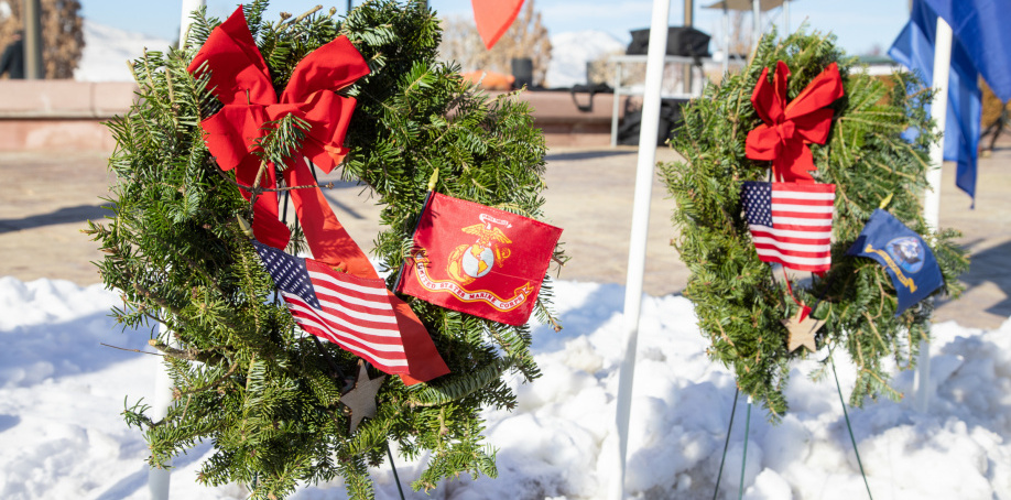 Wreaths being laid near graves for the Wreaths Across America event